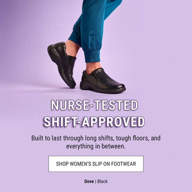 Nurse-Tested, Shift Approved. Built to Last Through Long Shifts, Tough Floors, and Everything in Between. Shop Women's Slip on Footwear. Dove | Black. a Woman Wearing the Dove Slip Ons in Black.
