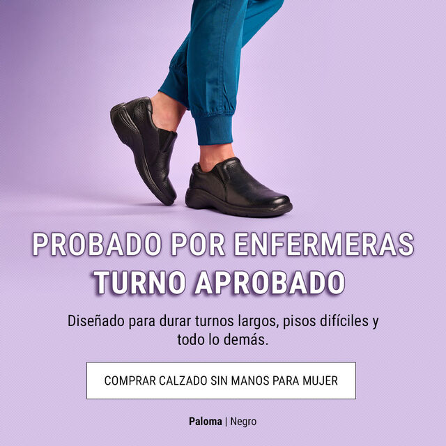 Probado Por Enfermeras. Turno Aprobado. Diseñado Para Durar Turnos Largos, Pisos Difíciles Y Todo Lo Demás. Comprar Calzado Sin Manos Para Mujer. Paloma | Negro. Una mujer que lleva las zapatillas Dove sin cordones en color negro.