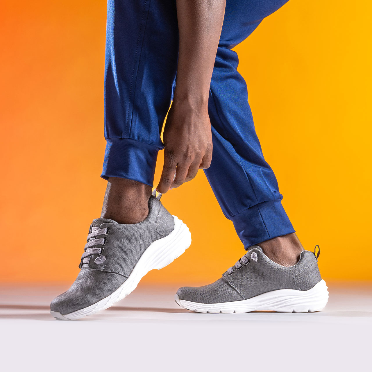 Woman wearing the Align&trade; Velocity slip on sneaker in Grey on foot.